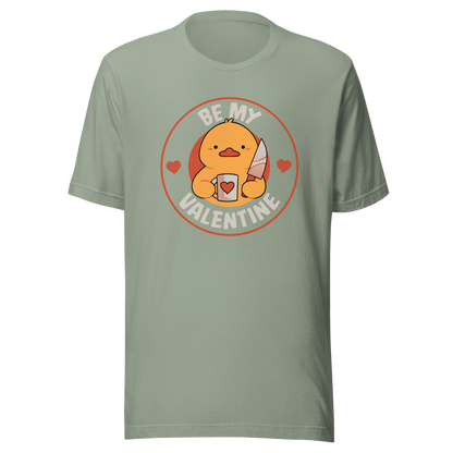 A cute duckling holding a heart-shaped coffee mug and a small knife, paired with the phrase ‘Be My Valentine Funny Duck’. A playful mix of cuteness and dark humor, perfect for coffee lovers and fans of ironic, quirky art.