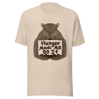 A brown bear holding a sign that reads “Hunger Made Me Do It”. This design plays on that classic bad mood that hits when hunger strikes. Perfect for those who live life with a good sense of humor, food lovers, and people who identify too much with that bad mood caused by hunger.