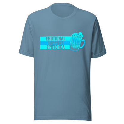 The design features a stylized mug filled with a frothy beverage, colored in vibrant shades of blue. Next to the mug, bold text reads 'EMOTIONAL SUPPORT SPOTCHKA'. The use of color and font style gives it a playful, pop-culture vibe, hinting at something fantastical or sci-fi influenced.