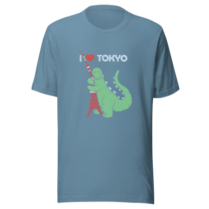 Funny cartoon monster hugging the Tokyo Tower under an “I Love Tokyo” sign. Retro-style parody artwork with vintage textures and playful giant-creature humor.