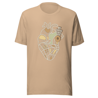 An anatomical heart illustrated like a map, marked with a small coffee-bean pin beside the phrase “My Coffee Lives Here”. A symbolic and cozy design that blends warmth and creativity, perfect for coffee lovers who treat their favorite brew as the fuel that keeps their heart beating.