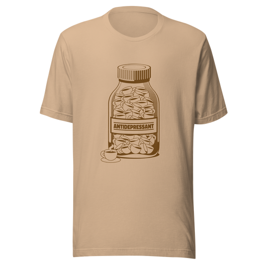 A medicine bottle filled with small coffee cups, labeled ‘antidepressant’. A playful, humorous design that celebrates coffee as a daily mood booster, perfect for coffee lovers who rely on caffeine to feel happier.