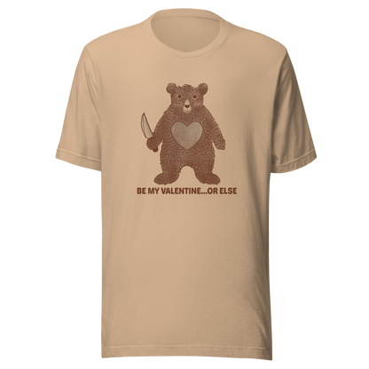 A bear with a slightly unhinged expression holding a knife beneath the phrase “Be My Valentine… Or Else”. This darkly humorous design blends cute and chaotic energy, making it perfect for those who love bears, sarcasm and a little Valentine’s Day mischief.
