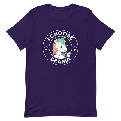 A cartoon unicorn with rainbow-colored mane holds a cup of tea and a heart, encircled by the words 'I Choose Drama'. Two small clouds with lightning bolts flank the unicorn, adding a playful yet slightly edgy vibe. The design is bold and whimsical with a pop-art influence.
