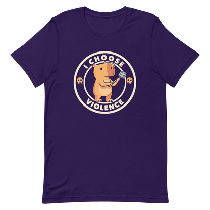 A cute, cartoonish burnt yellow capybara stands holding a spiked mace with a determined expression. Surrounding it is a circular design with the text 'I CHOOSE VIOLENCE' and two small skulls on either side, giving it a humorous yet ironic tone.