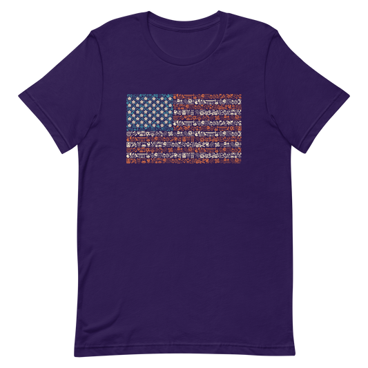 American flag illustration made entirely of retro video game icons, controllers, characters, and symbols in blue, red, and beige, arranged to form the stars and stripes.