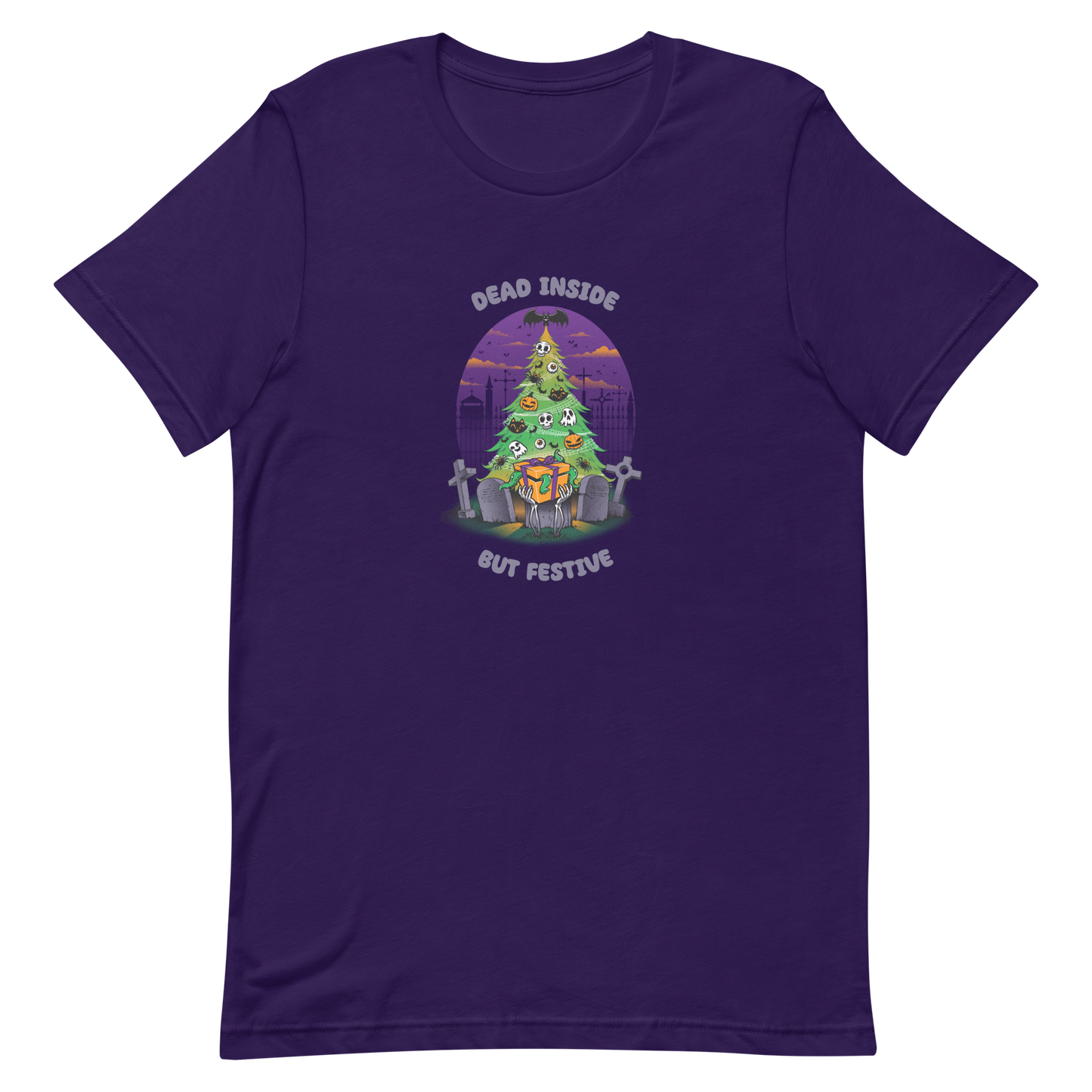 A quirky illustration features a Christmas tree decorated with skulls, pumpkins, and bats, set in a graveyard. The sky is purple and orange, with bats and tombstones surrounding the tree. A skeleton hand holds a festive gift box at the base. Above, text reads "Dead Inside" and below, "But Festive". The design combines Halloween and Christmas elements in a humorous style, highlighting a gothic and festive theme.