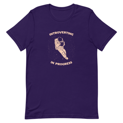 An astronaut floats in space while reading a book, surrounded by twinkling stars. The artwork represents the beauty of introspection and a quiet retreat amidst the universe. Perfect for introverts, passionate readers and dreamers who love the combination of space and tranquility.