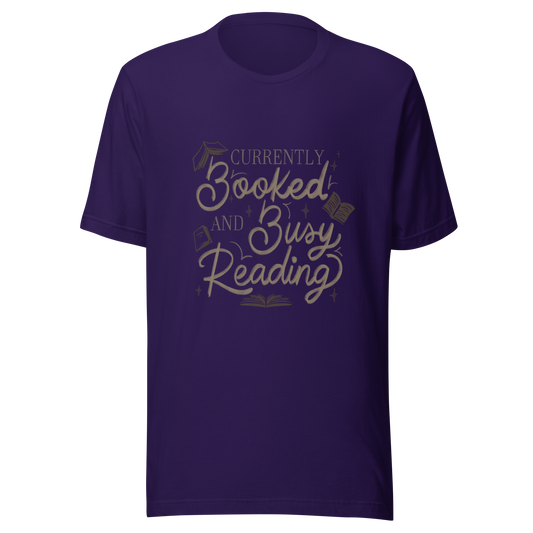 A warm hand-lettered typography featuring the phrase ‘Currently Booked and Busy Reading’, accented with delicate book illustrations and subtle sparkles on a dark background. A cozy, elegant design that celebrates the joy of reading, perfect for book lovers, students, introverts, and anyone who would rather be reading.