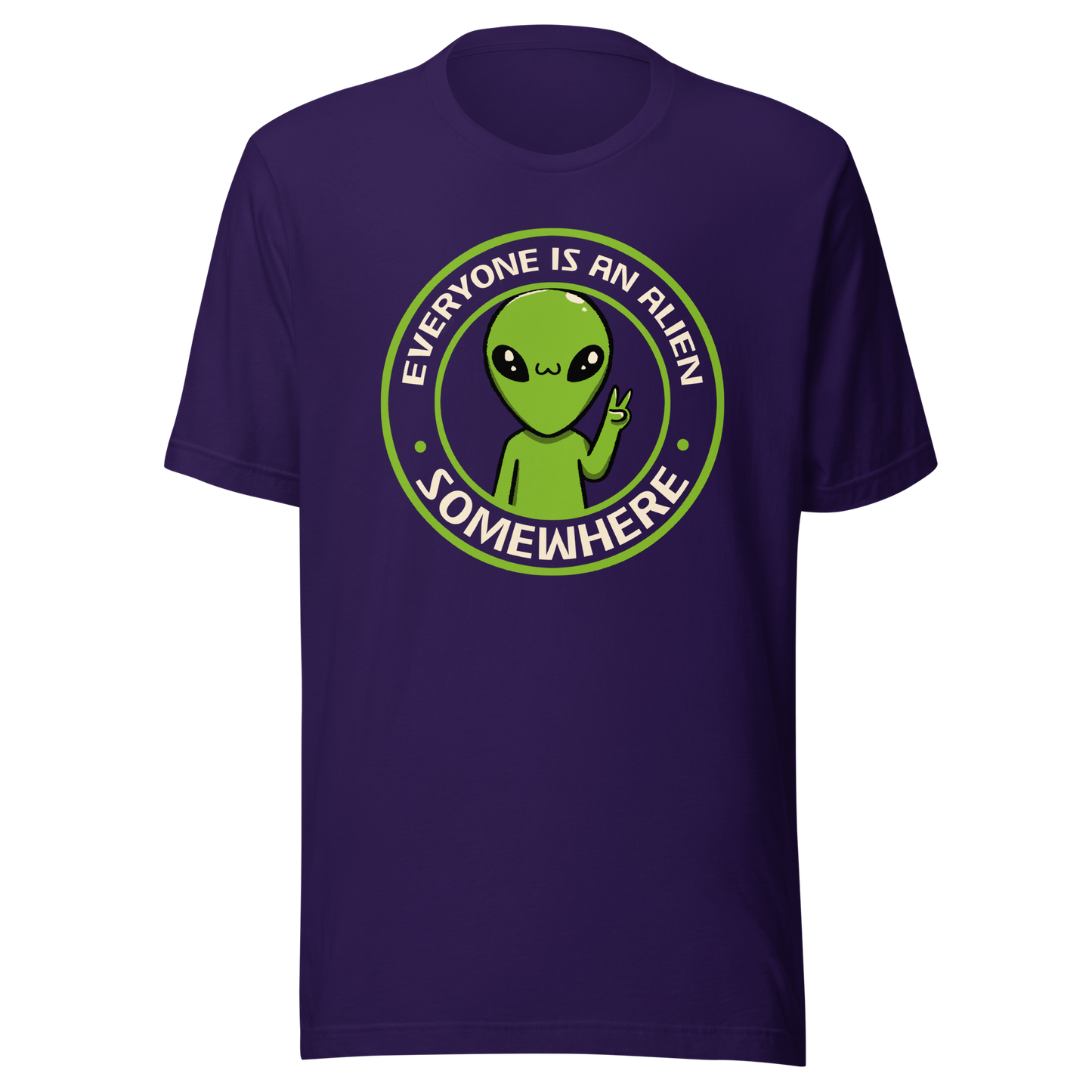 A stamp-style design of a green alien making a “V” sign, paired with the phrase “Everyone Is An Alien Somewhere”. A playful artwork about feeling different and embracing individuality.