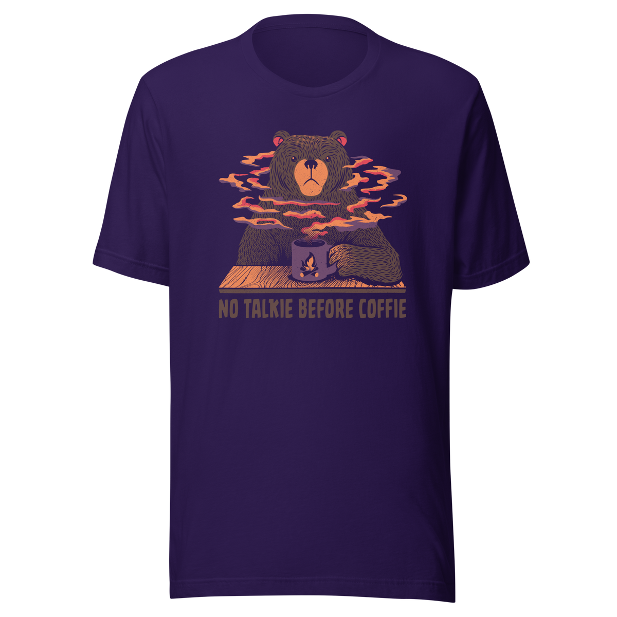 A large brown bear holding a purple coffee cup with a campfire design, with steam rising as if the coffee were piping hot. Below it appears the phrase ‘No Talkie Before Coffie’. A fun design for coffee lovers and anyone who isn’t ready to talk before their first cup.