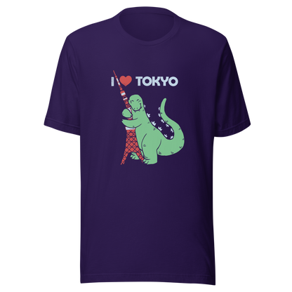 Funny cartoon monster hugging the Tokyo Tower under an “I Love Tokyo” sign. Retro-style parody artwork with vintage textures and playful giant-creature humor.