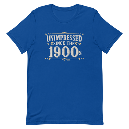 Vintage-style graphic with the phrase “Unimpressed Since the 1900s” in bold distressed lettering, decorated with ornate flourishes and a retro color palette.