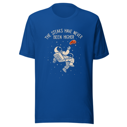 An astronaut floating through space with a small steak in front of him, paired with the phrase ‘The Steaks Have Never Been Higher’. A playful and humorous design that blends space exploration with a clever visual pun. Perfect for fans of witty wordplay and quirky art.