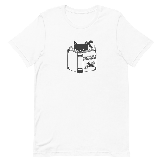 A black and white illustration features a cat peeking over an open book titled 'How to Kill a Mockingbird,' playfully altering the classic novel's title. The cat has a heart-shaped nose and simple, cute facial features. The design is whimsical and ironic, combining classic literature with a humorous twist.