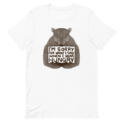 The image shows a humorous, detailed illustration of a bear, drawn in a hand-drawn style, holding a sign that reads 'I'm sorry for what I said when I was hungry.' The bear appears to be apologizing in a comical, endearing manner, making it a relatable and light-hearted design.