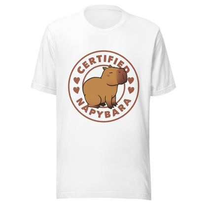 An art piece in warm beige and brown tones featuring a relaxed, sleepy capybara sitting peacefully beside the phrase “Certified Napybara”. A cozy, humorous design perfect for anyone who relates to slow days, loves capybaras, and fully embraces the art of taking naps.