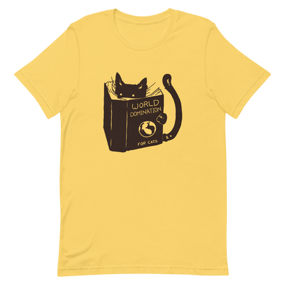 The design features a black silhouette of a cat peeking from behind an oversized book. The book's cover reads 'World Domination for Cats,' and includes a simple drawing of a globe. The cat's eyes are wide open, suggesting either surprise or intense focus on its 'world domination' plans.