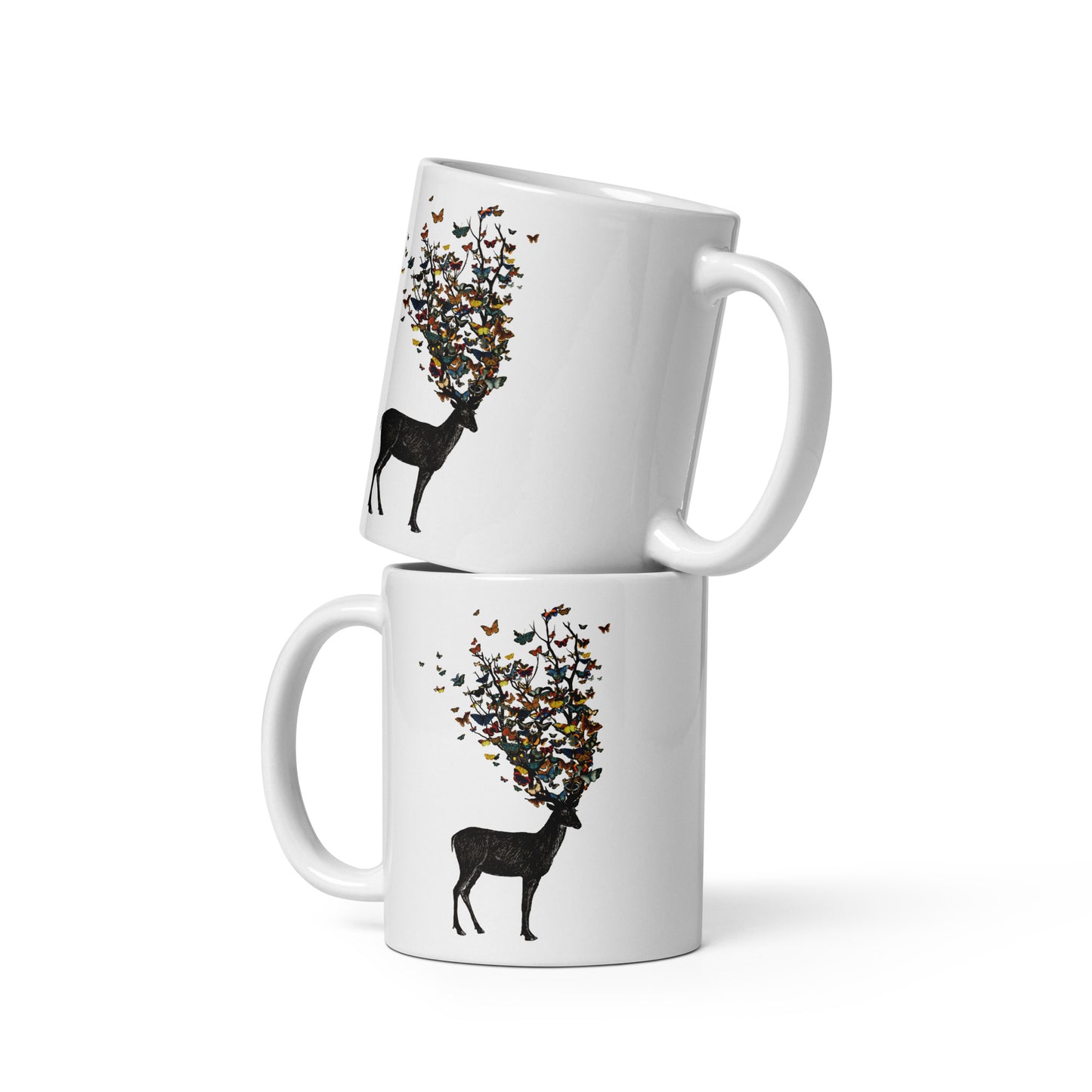 The image depicts a dark, silhouetted deer standing on a neutral background. Instead of branches, its antlers transform into a swirling cloud of vibrant, colorful butterflies that extend upwards and outward. The mix of organic and ethereal elements creates a captivating and whimsical visual contrast.