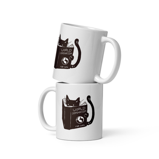 The design features a black silhouette of a cat peeking from behind an oversized book. The book's cover reads 'World Domination for Cats,' and includes a simple drawing of a globe. The cat's eyes are wide open, suggesting either surprise or intense focus on its 'world domination' plans.