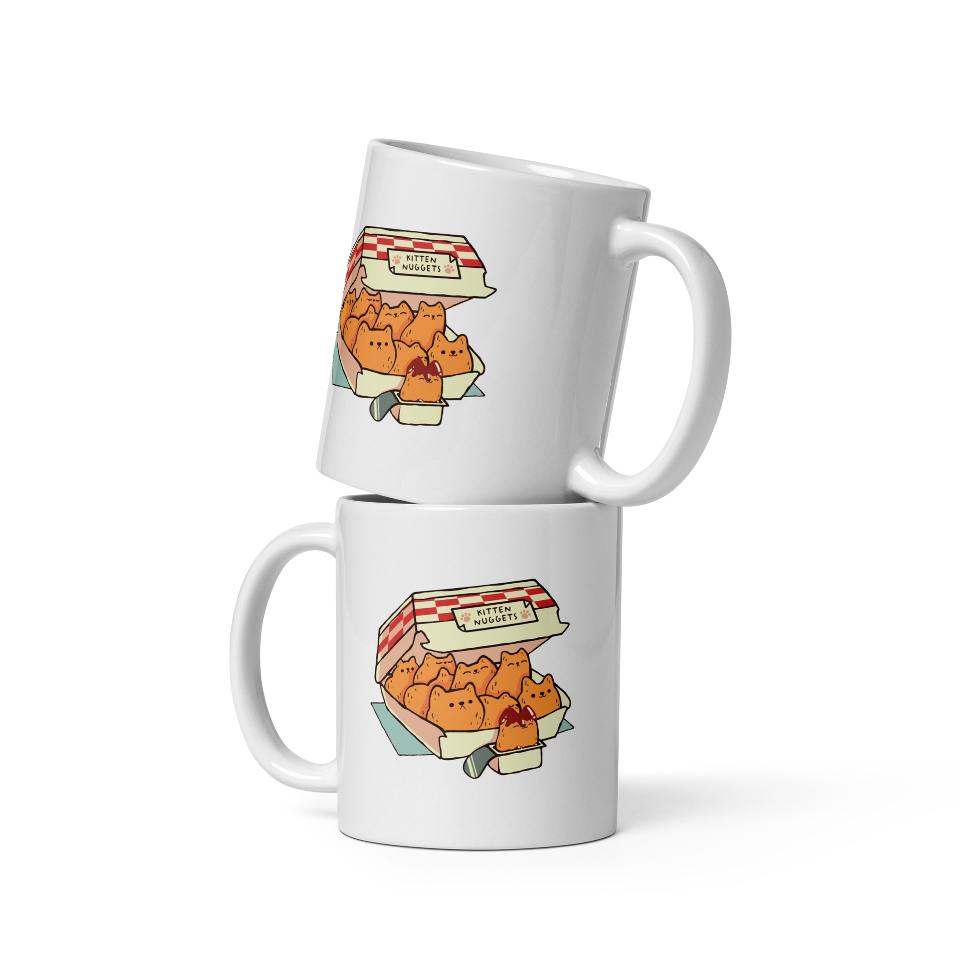 A box of cute nuggets that are shaped like cute kittens. An art that mixes humor, kittens and fast food.